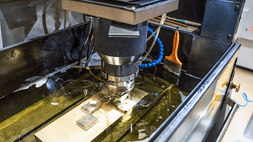 Workpiece undergoing EDM machining 