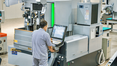 The technician fed the spec to the EDM machine 